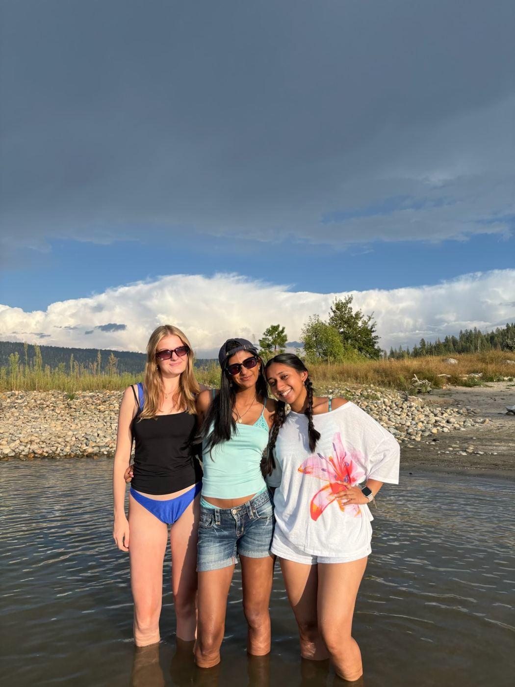Members by the river